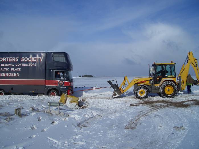 Towing it out - - almost there
