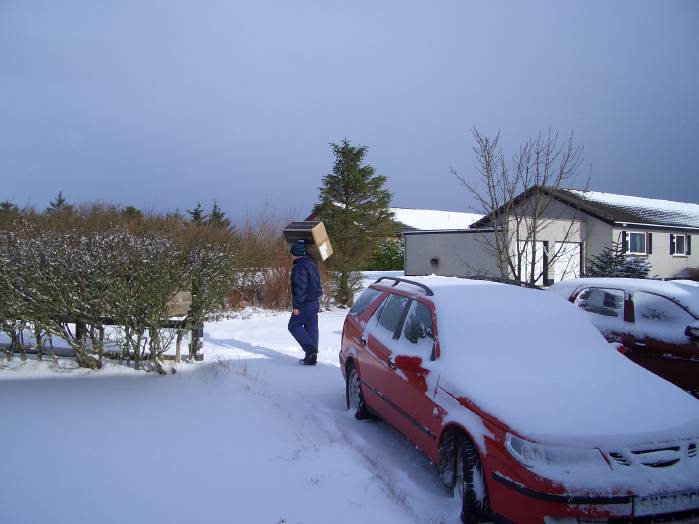 Carrying boxes down to the van